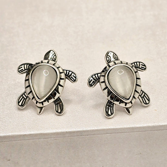 A562 White Stone Turtle Post Earrings