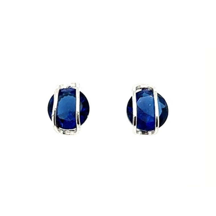 A160 Elegantes aretes de poste de circón azul