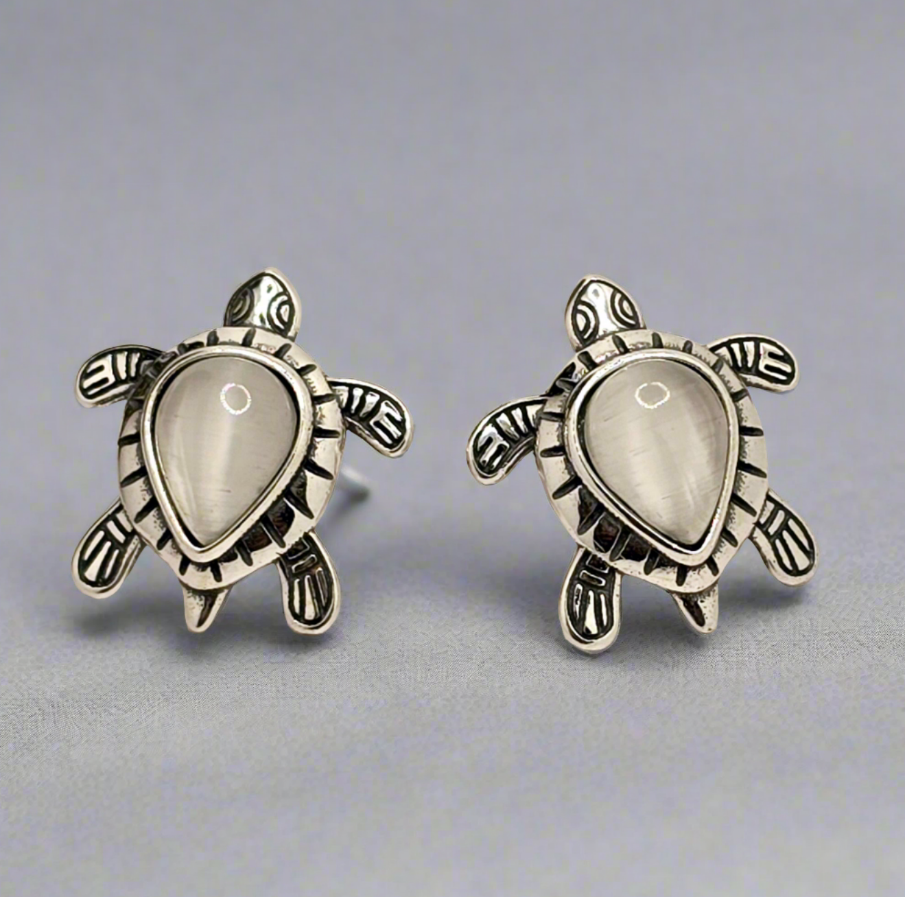 A562 White Stone Turtle Post Earrings