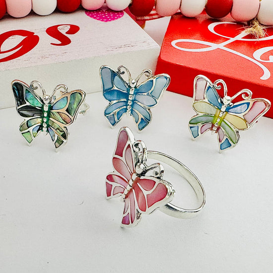 Anillo de mariposa con piedra azul R1075