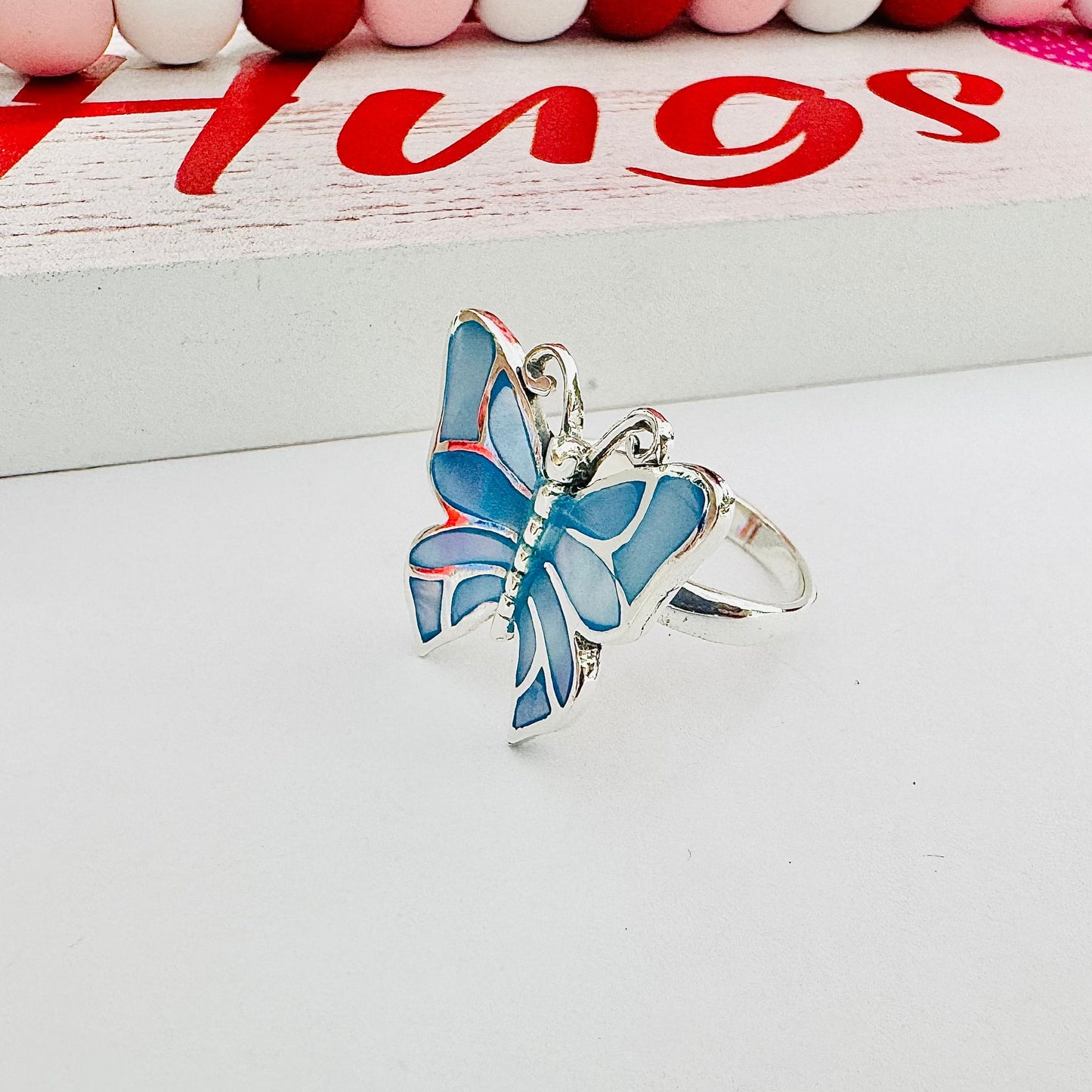 Anillo de mariposa con piedra azul R1075