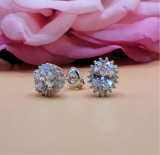 A631 Round Diamond Accent Post Earrings