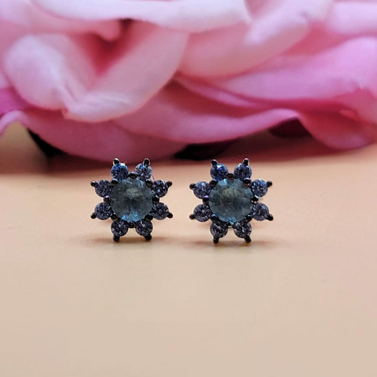 A676 Aretes con poste decorativo de diamante azul y estrella