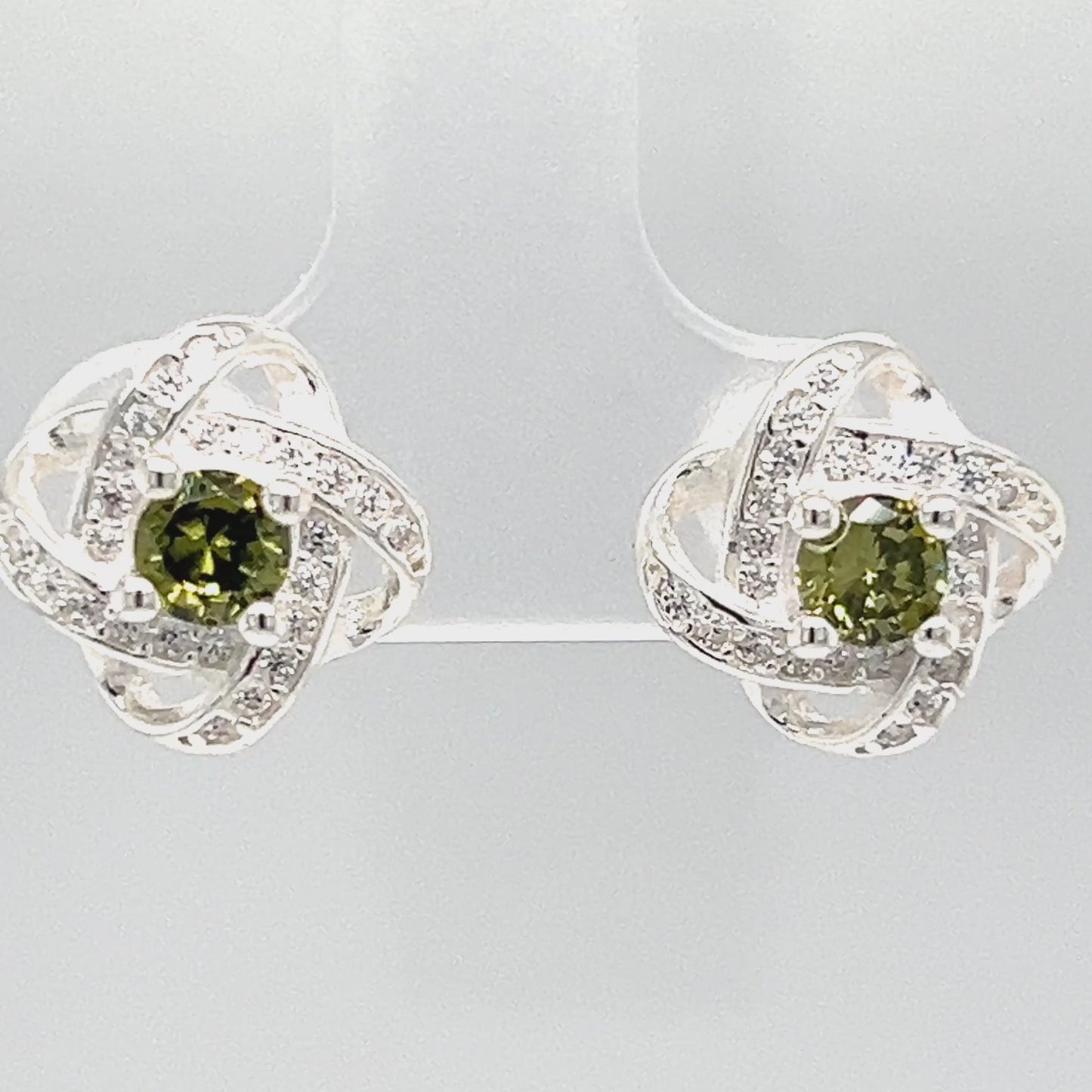 Load and play video in Gallery viewer, A288 Bright Loop With Green Center Post Earrings
