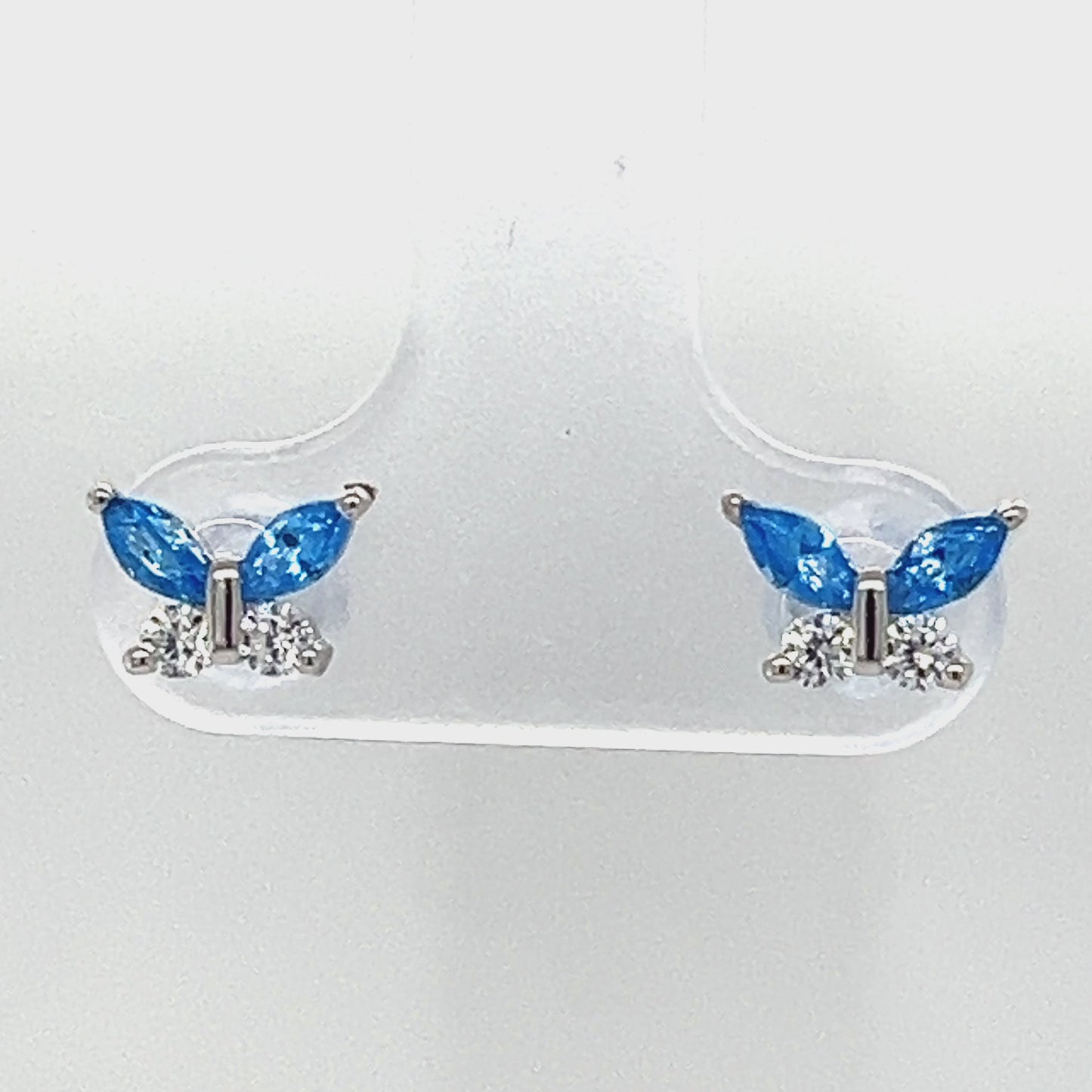 Cargar y reproducir el video en el visor de la galería, A801 Pendientes de mariposa azul con poste de circonita
