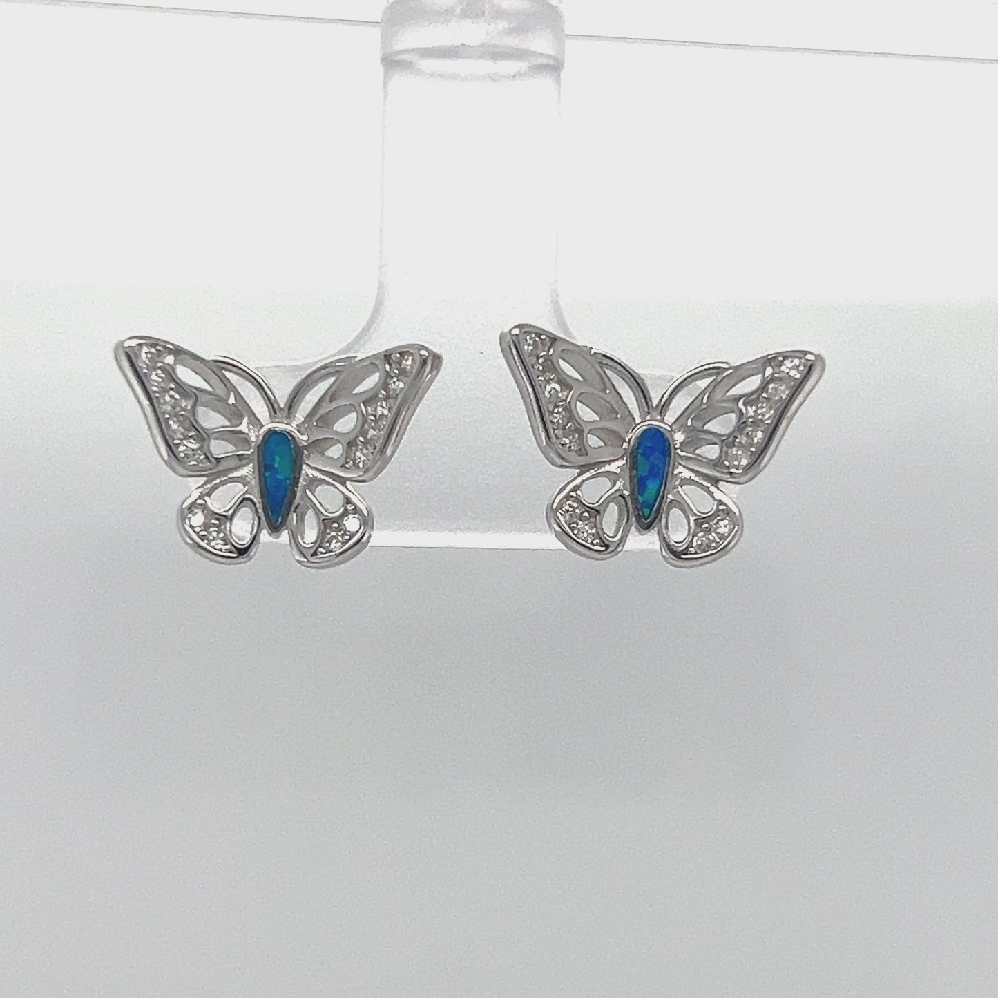 Load and play video in Gallery viewer, A807 Butterfly with Blue Opal Stone Post Earrings
