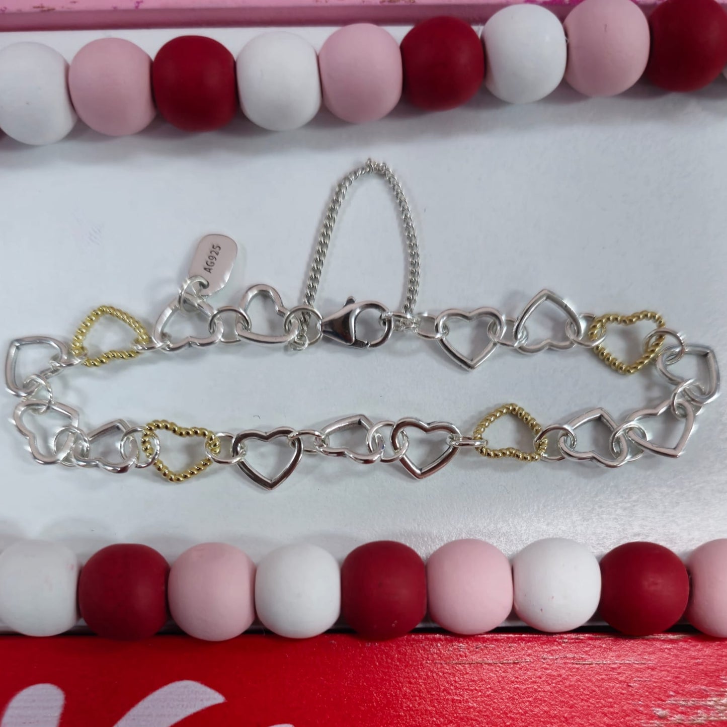 Pulsera M595 de corazones lisos en oro y plata